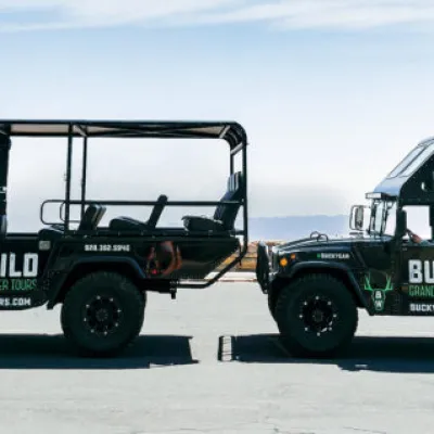 A profile shot of the Buck Wild hummers and their tour-drivers