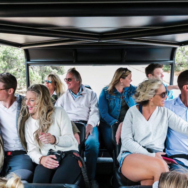 A tour group is all smiles during their Buck Wild adventure