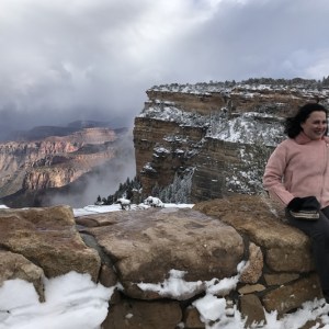 Woman in the Grand Canyon with Buck Wild Hummer Tours in Winter