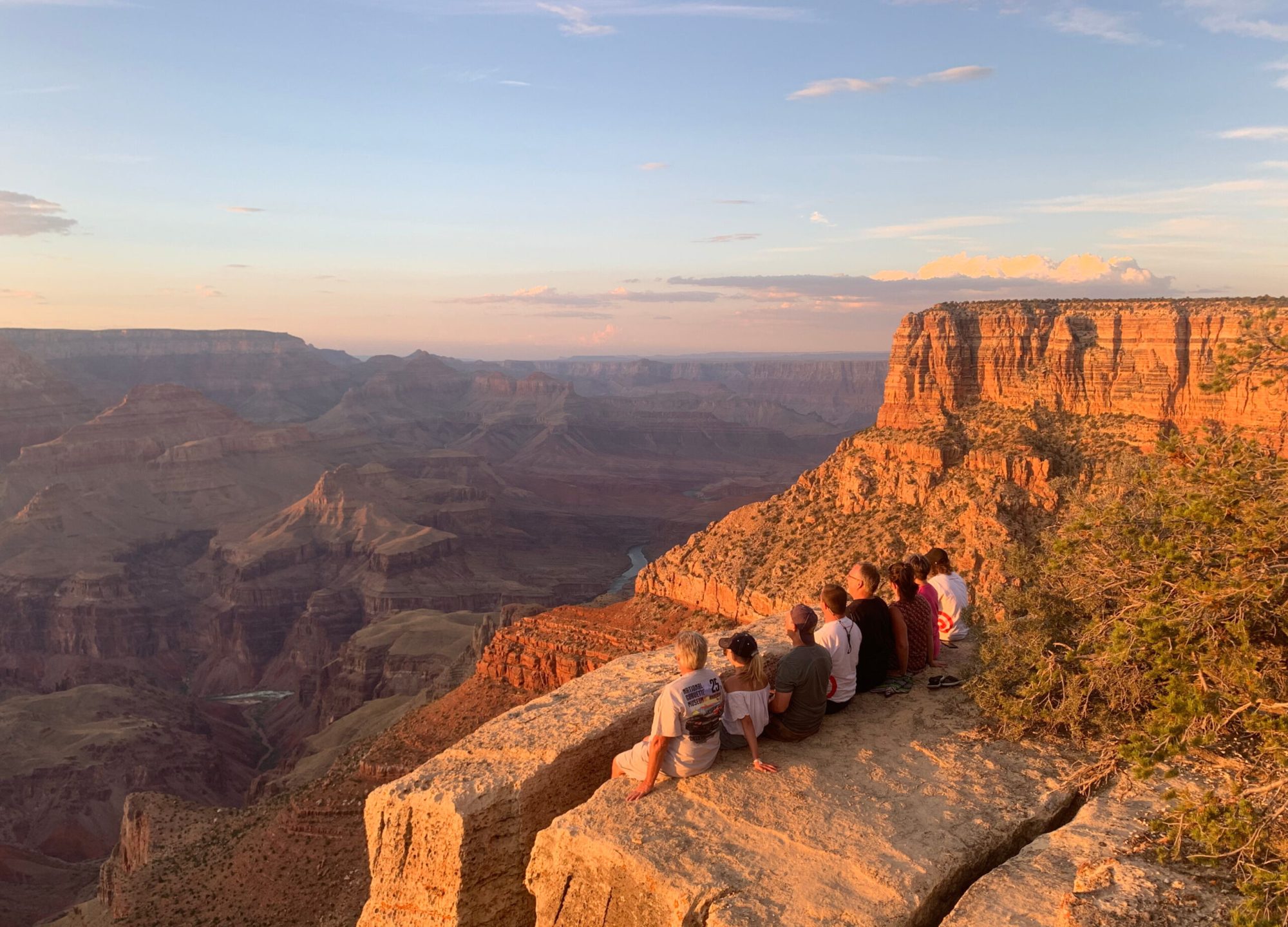 Family at the grand canyon a view of the grand canyonat sunset