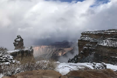 Grand Canyon South Rim in the snow with fog