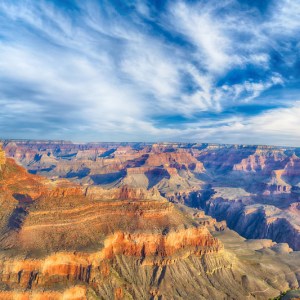 a canyon with a mountain in the background