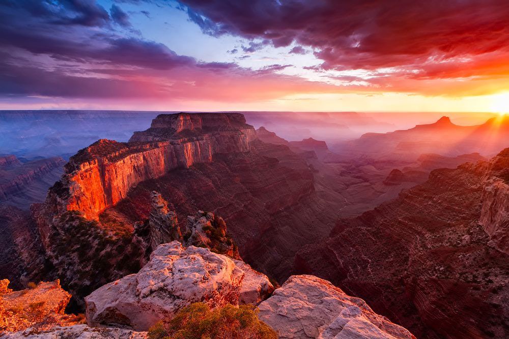 a canyon with a mountain in the background